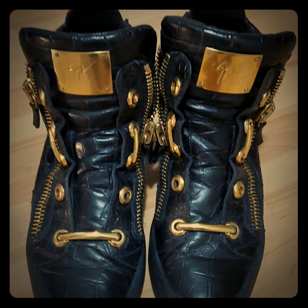 Used giuseppe black and gold hightop sneaker